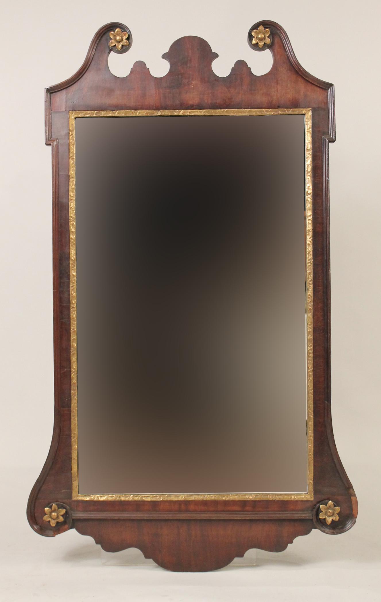 George III Parcel-Gilt Mahogany Mirror: English, c. 1770. Repairs and losses to molding. 4'1"h x 29"w