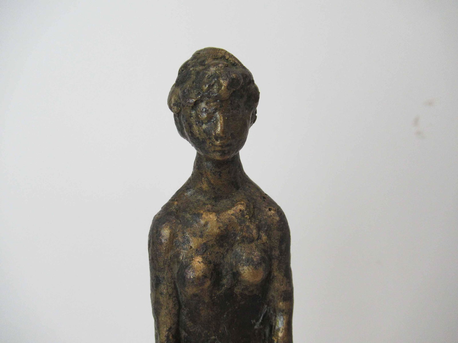 Bruno Lucchesi Bronze Nude Statue: Bruno Lucchesi Bronze nude Statue of a woman standing mounted on wooden base. Used condition Statue height 7 1/2" tall.