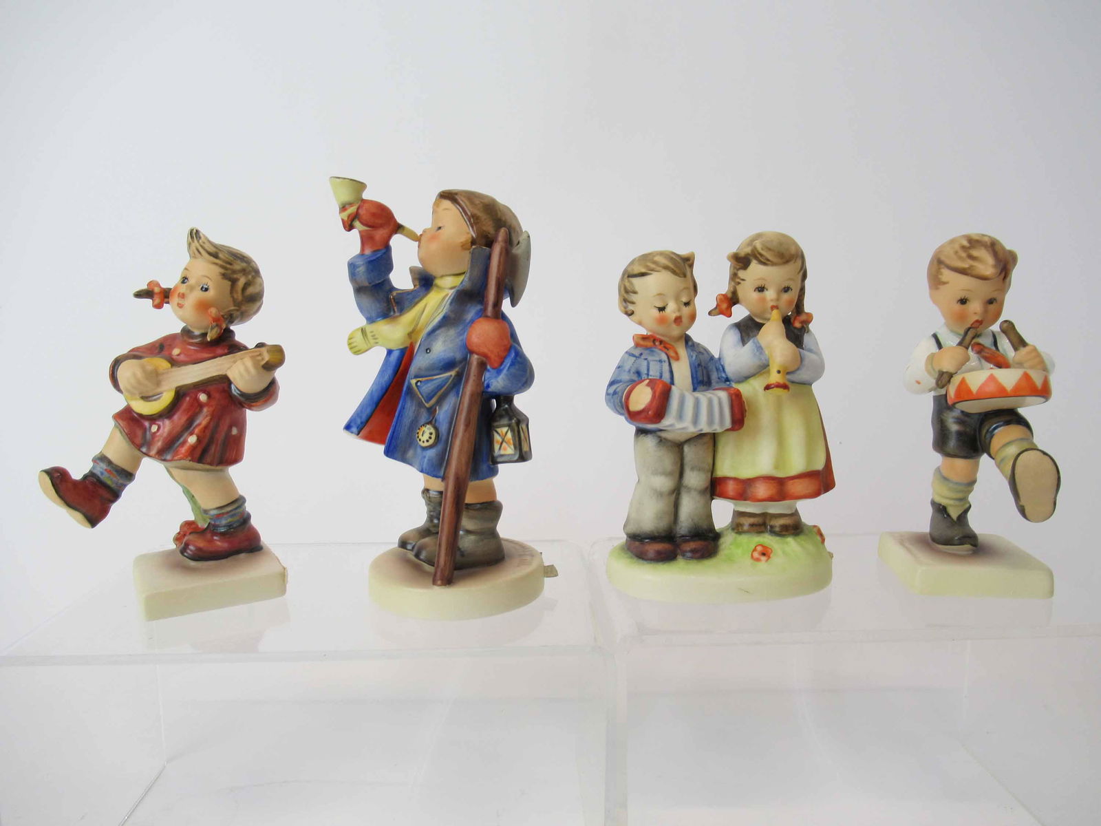 Four M. J. Hummel Goebel Figurines (1 of 7)