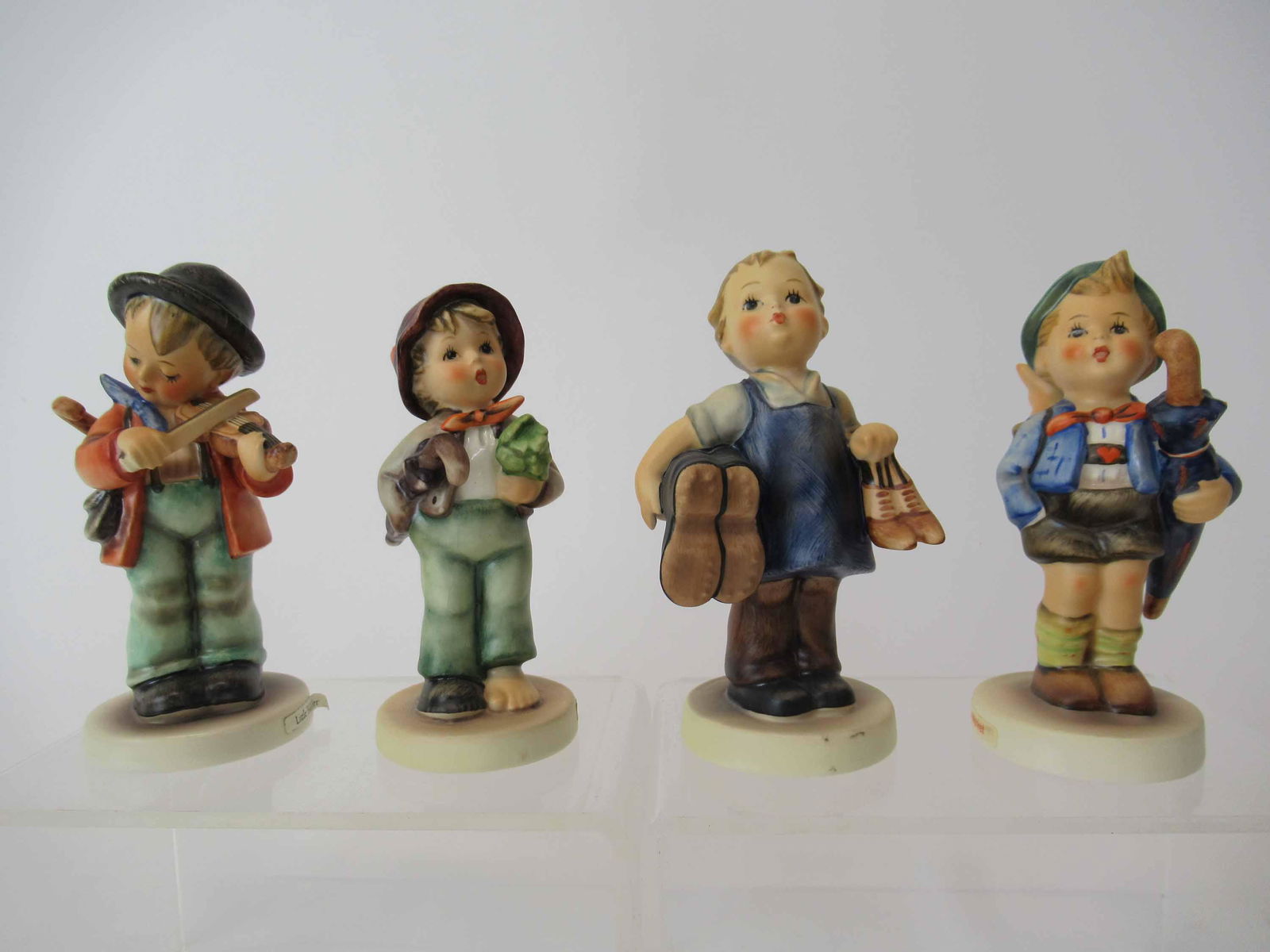 Four M. J. Hummel Goebel Figurines (1 of 9)
