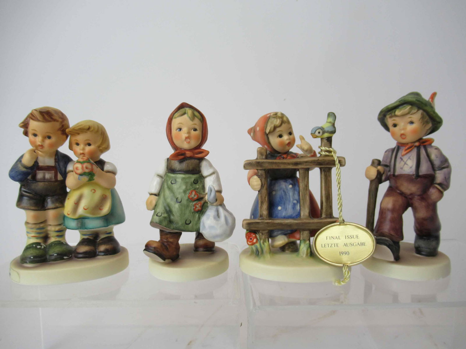 Four M. J. Hummel Goebel Figurines (1 of 8)