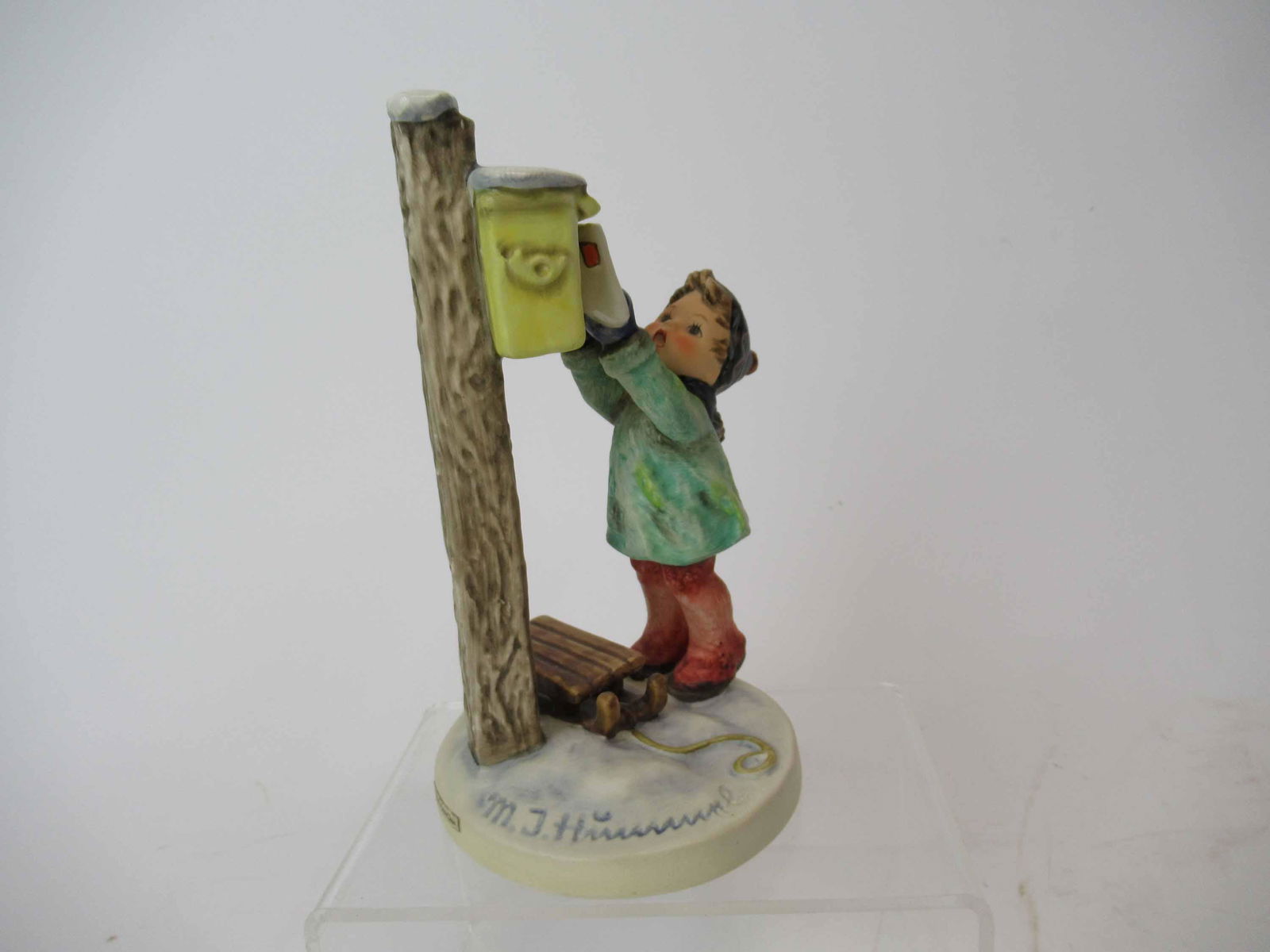 M. J. Hummel Goebel Figurine: M. J. Hummel Goebel Figurine Titled A Letter to Santa Claus, together with box. Used condition. 7" tall x 4"x 3 3/4"