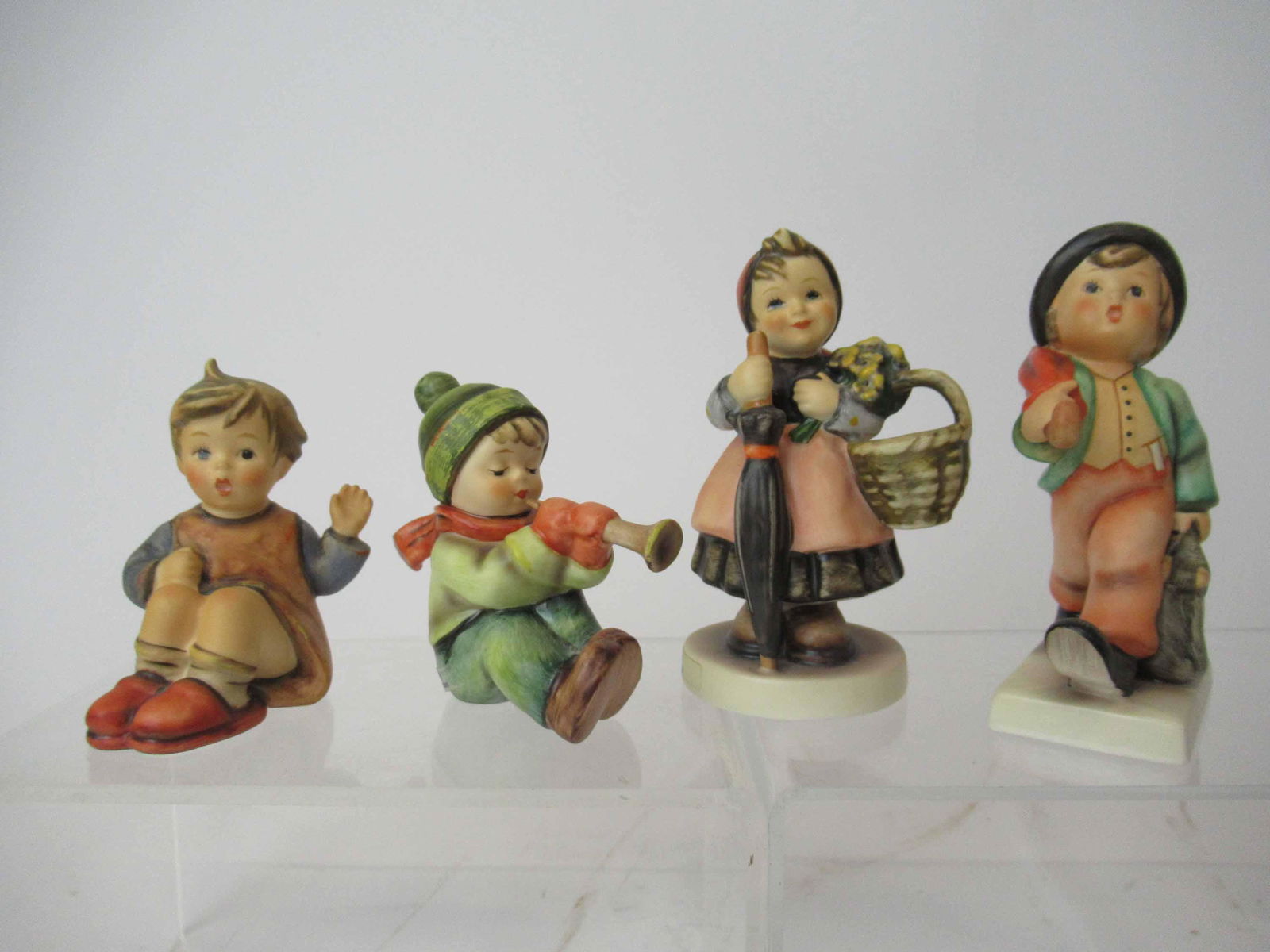 Four M. J. Hummel Goebel Figurines (1 of 7)