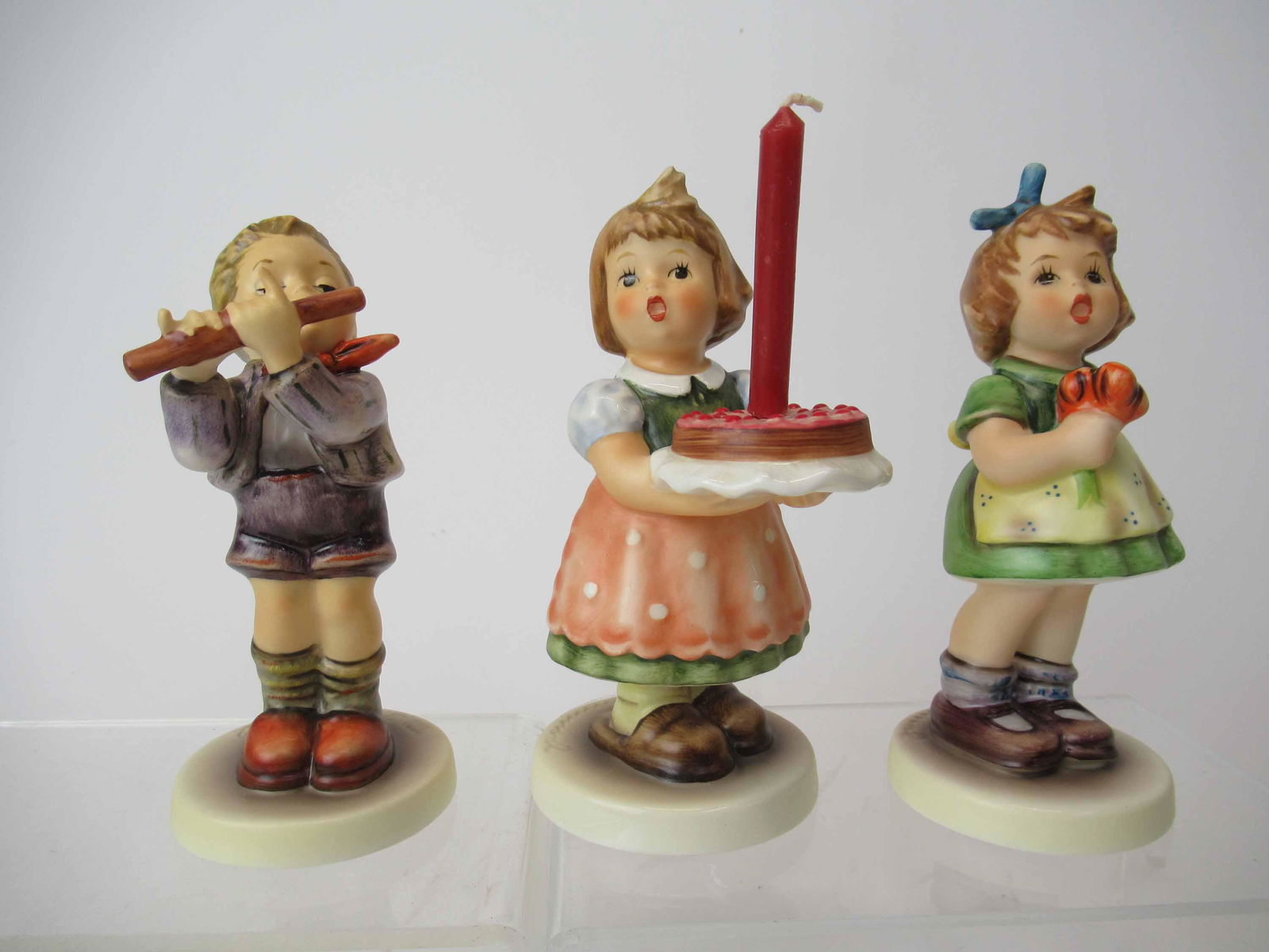 Three M. J. Hummel Goebel Figurines (1 of 5)