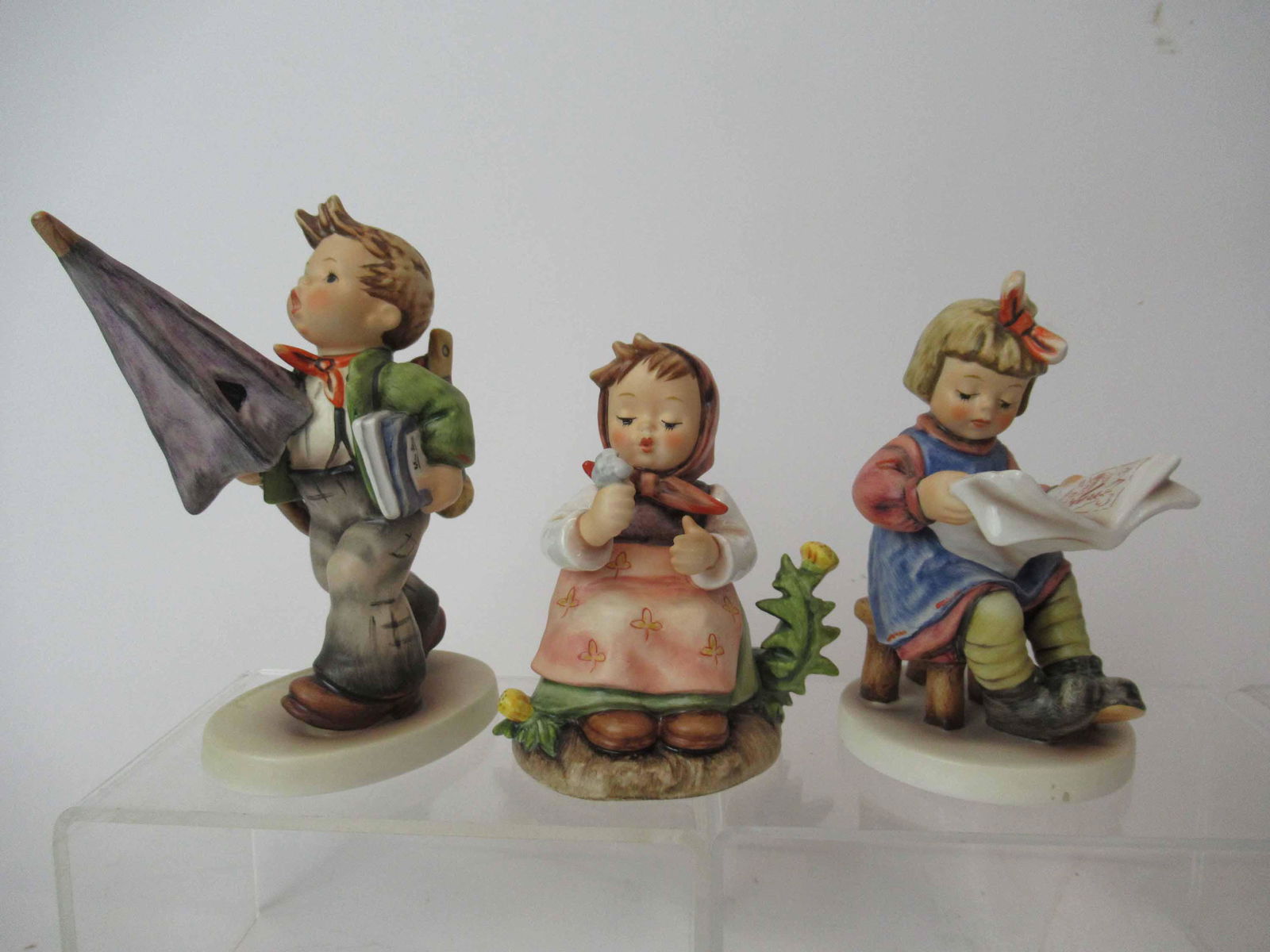 Three M. J. Hummel Goebel Figurines (1 of 4)