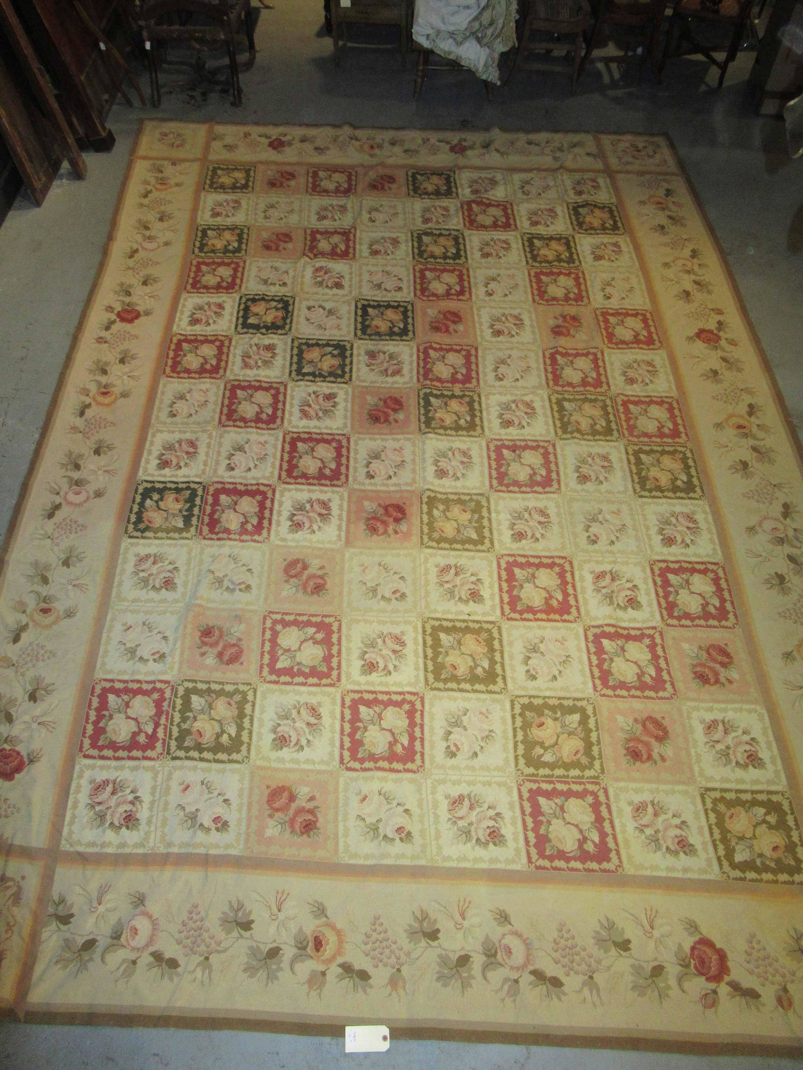 Aubusson Carpet: Faded on one side, stains. 15'5"l x 10'7"w