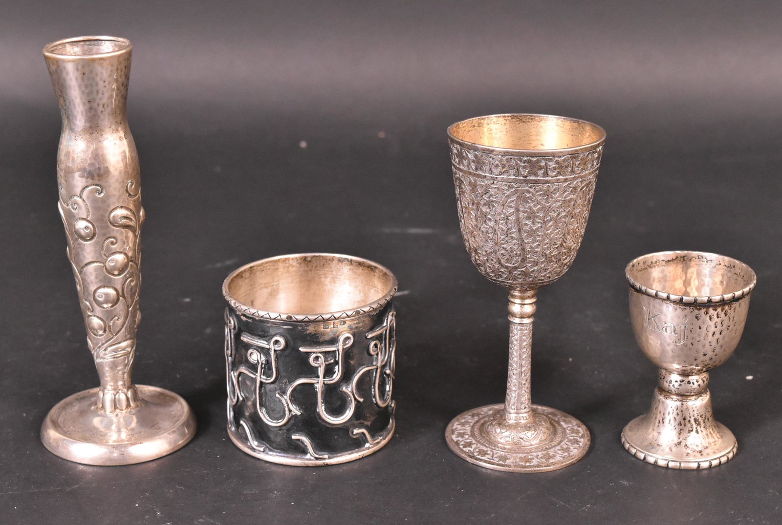 Indian Silver Footed Cup, Dec. 1876 Inscription: All-over chased stylized floral and foliate motif, underside foot rim engraved inscription "Presented to John Marshall Esq. FRS By BD Bose (Bengal) In Grateful Recognition of His Kindness Dec. 1876",