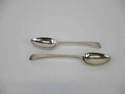 Two English Georgian Silver Place Spoons: Both hallmarked HB, Hester Bateman, one crested the other monogrammed, London, 1809, 1823, each 6-3/4"l, total weight approx. 2 T.O.