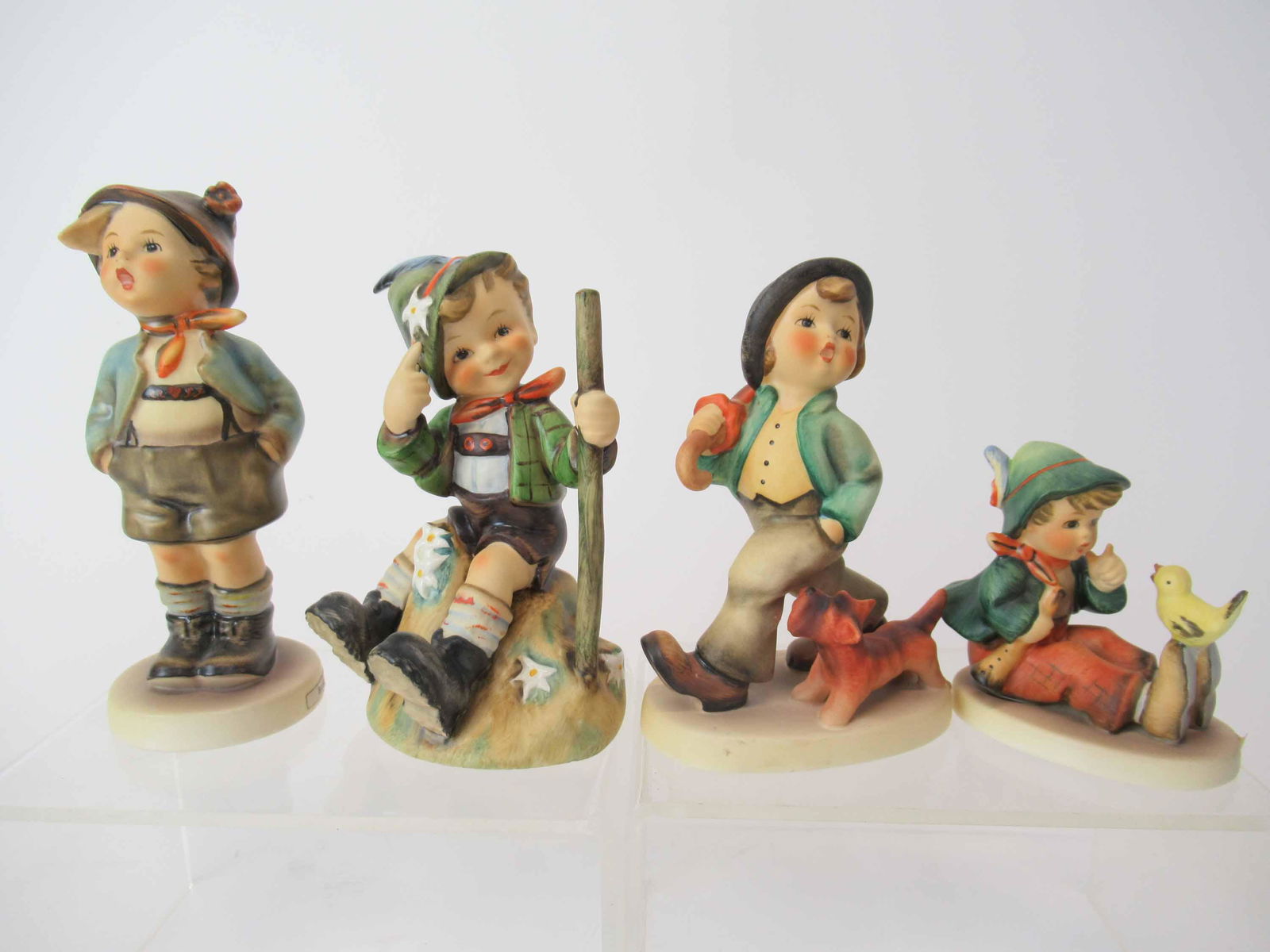 Four M. J. Hummel Goebel Figurines (1 of 8)