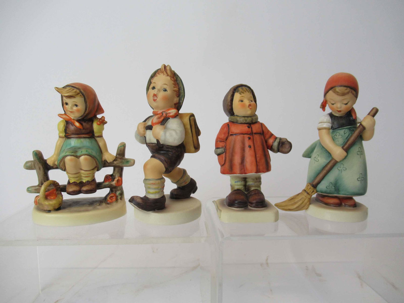Four M. J. Hummel Goebel Figurines (1 of 6)