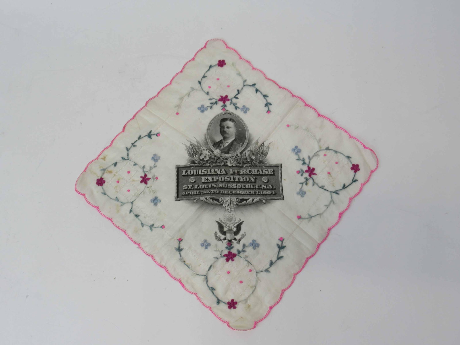 Louisiana Purchase Exposition Silk Handkerchief: Louisiana Purchase Exposition Silk Handkerchief St Louis, Missouri, USA. April 30, to December 1, 1904 having hand embroidered floral decoration. Used condition, stains. 10 1/2" x 11"