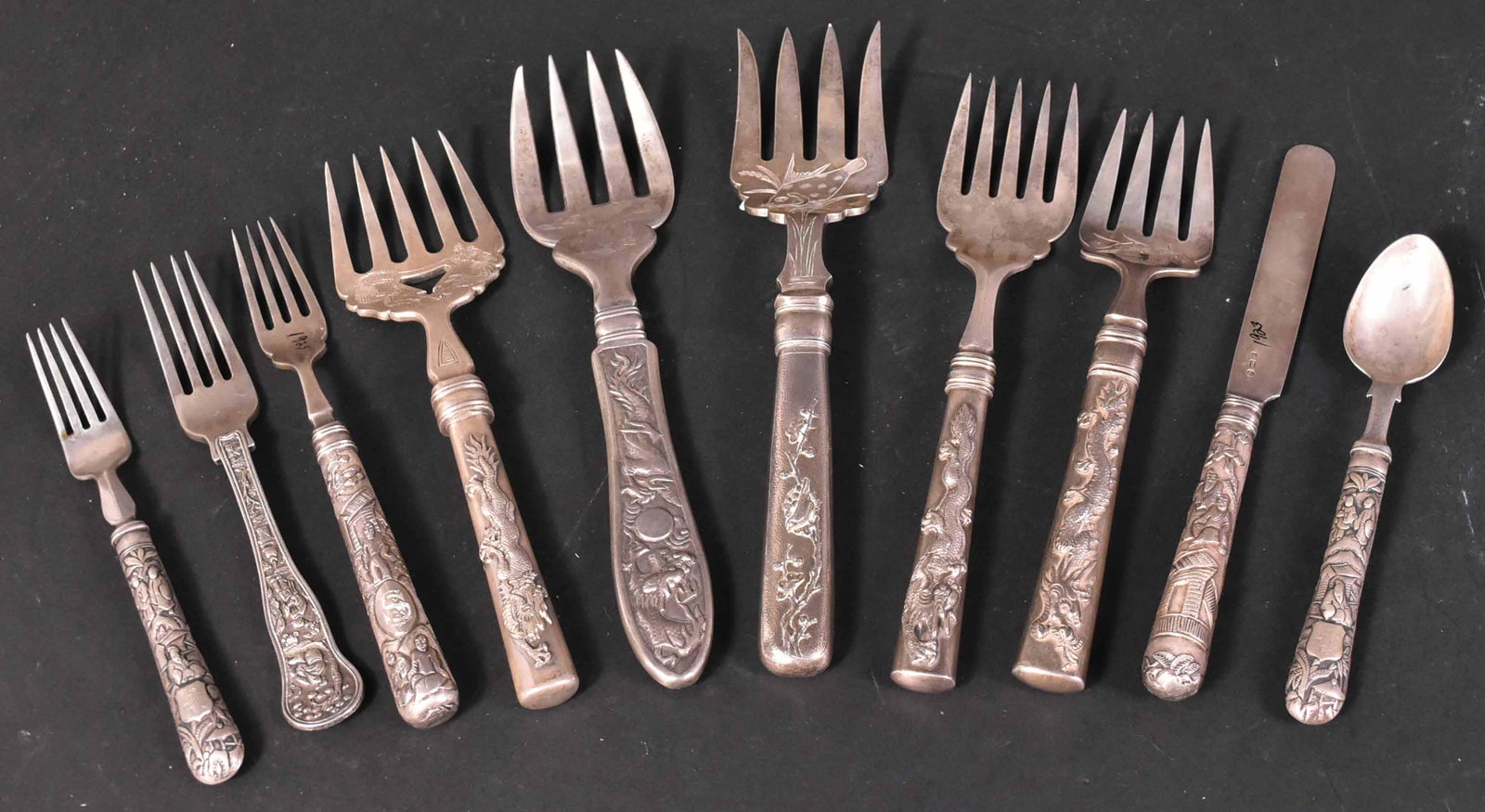Tuck Chang Chinese Silver Serving Fork: Together with four additional serving forks of various makers. Together with five flatware items. 9.5"l Provenance: Property from the Collection of Myrna and Bernard Posner. Apx. 31 t.o.
