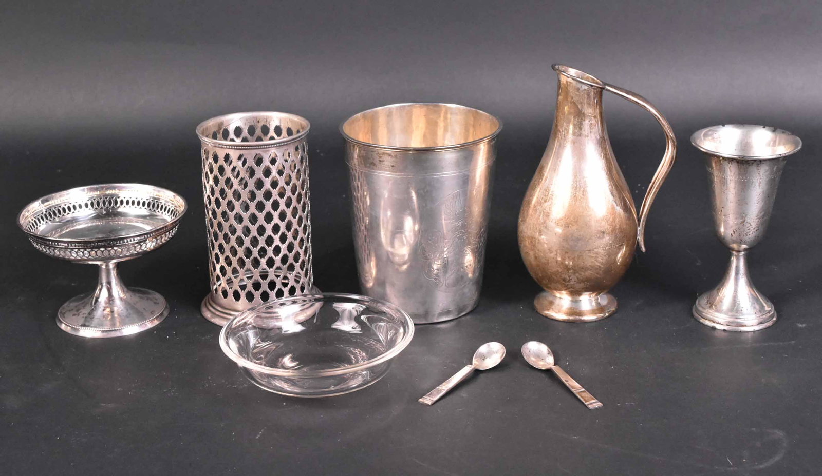 Continental Silver Beaker: Engraved coat-of-arms, 4"h. Together with a Aipsa Peruvian sterling silver pitcher, 5-1/2"h, silver kiddish cup, and a 800 silver sherbet cup holder with glass insert, sterling silver pierced condimen