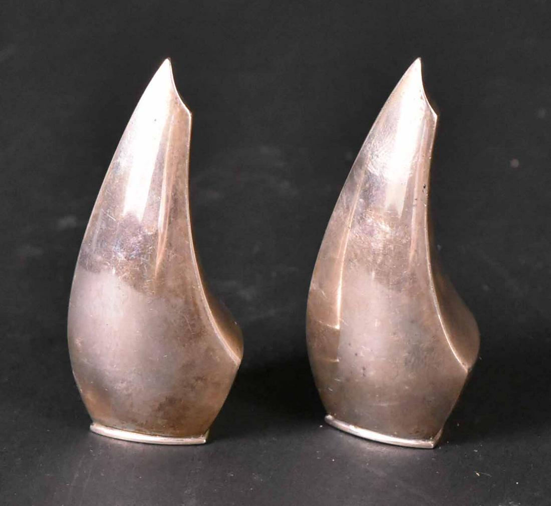 Pair of ABSA Denmark Sterling Silver Shakers: Modernist scuptural form, salt & pepper shakers, each 2-3/4"h, weight approx. 2 T.O. Provenance: Property from the Collection of Myrna and Bernard Posner
