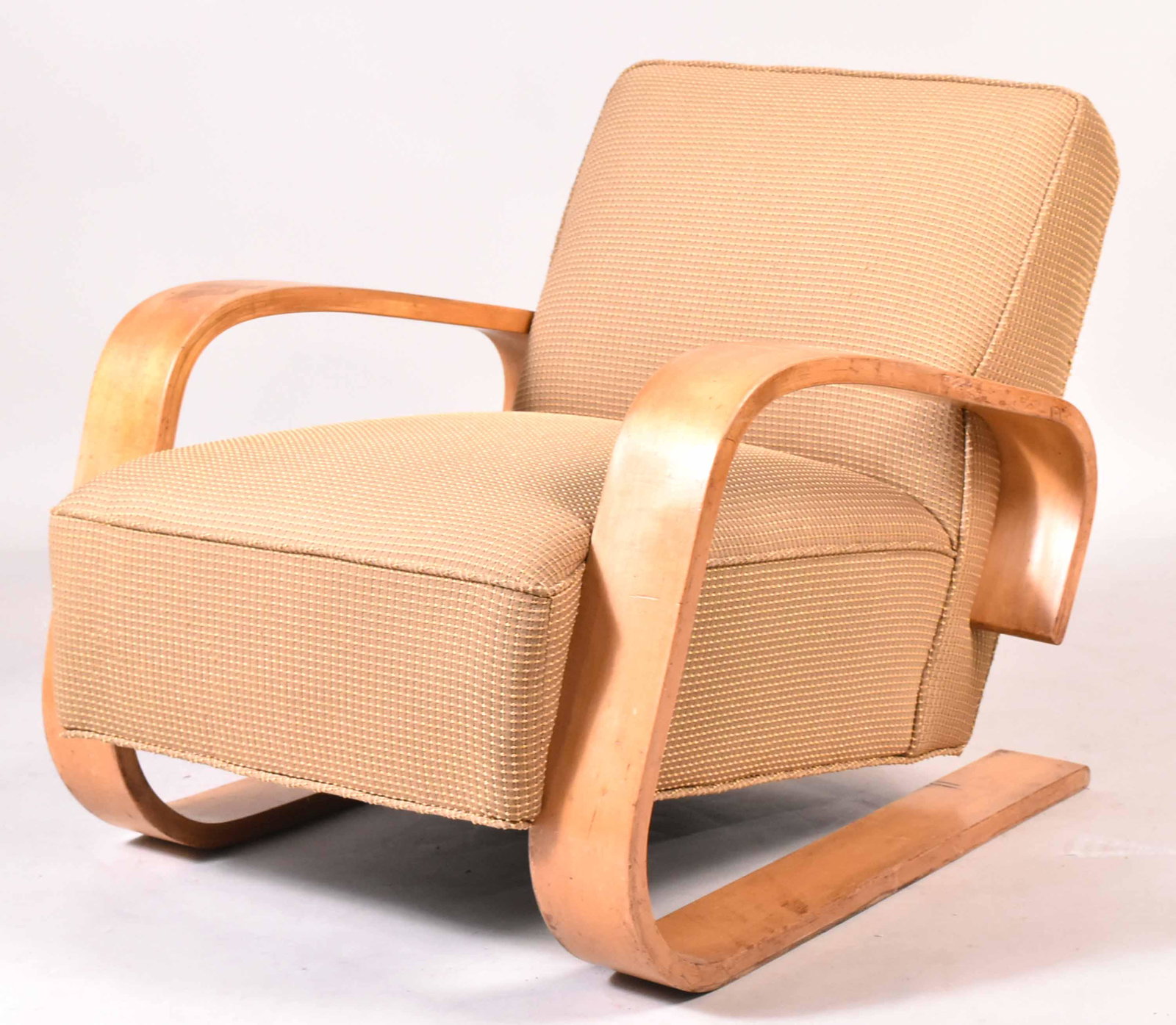 Alvar Aalto Tank Chair: 20th C., some wear to fabric. 27-1/2"h x 29"w x 34"d Provenance: From the Estate of Hugh Romney, St., Wavy Gravy's father.