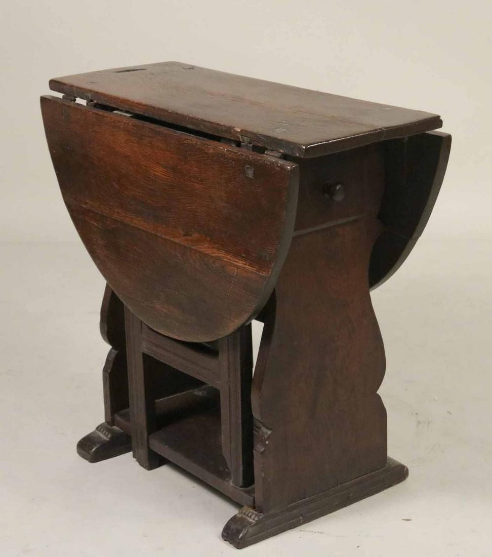 Elizabethan Style Trestle Base DropLeaf Oak Table: English. 28-3/4"h x 31"w x 13-1/4"d (closed)