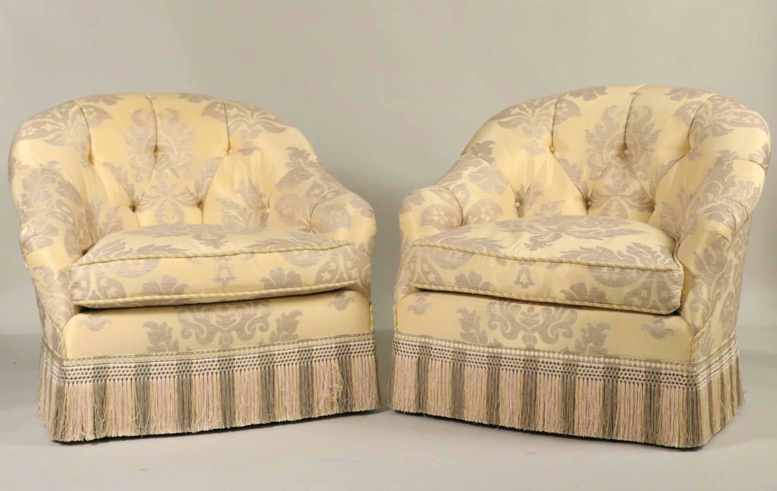 Pair of Contemporary Upholstery Club Chairs: With pale yellow and gray damask fabric. Apx. 34"h x 37"w over arms, seat 23"d