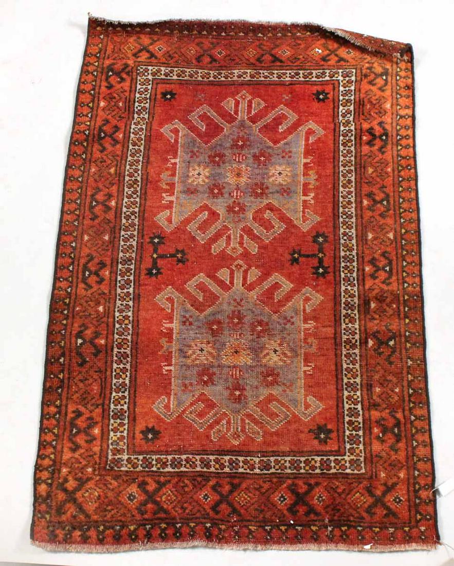 Afghan Throw Rug: 20th C., worked in tones of rust, blue, and tan. 4'1"l x 32"w