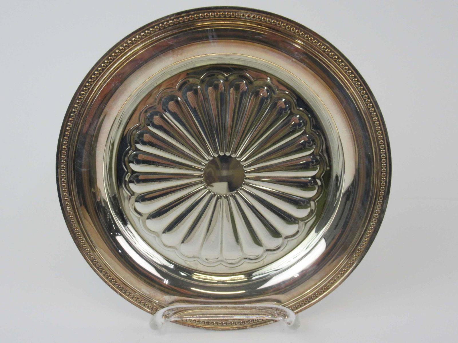 Christofle Silverplated Wine Caddy: Christofle Silverplated Wine Caddy together with its original box. Used condition. 5 7/8" diameter