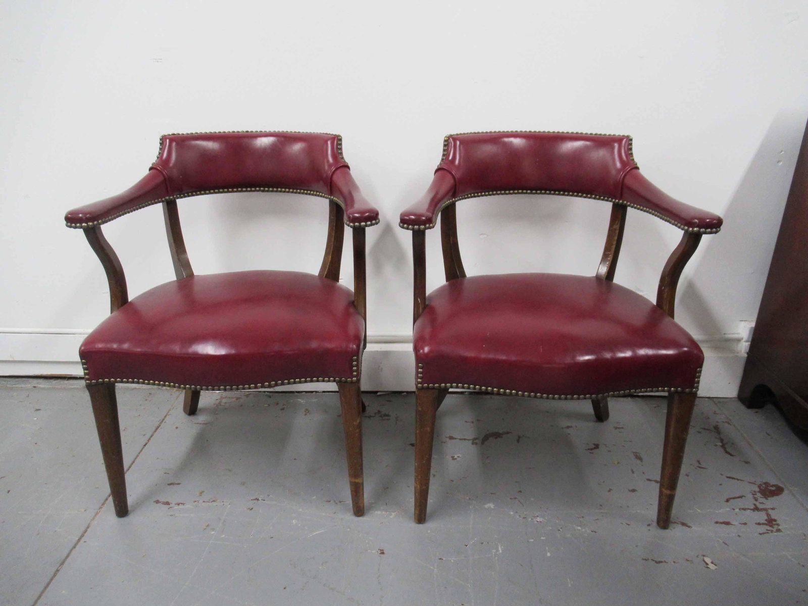 Pair of Oxblood Naugahyde Captains Chairs (1 of 5)
