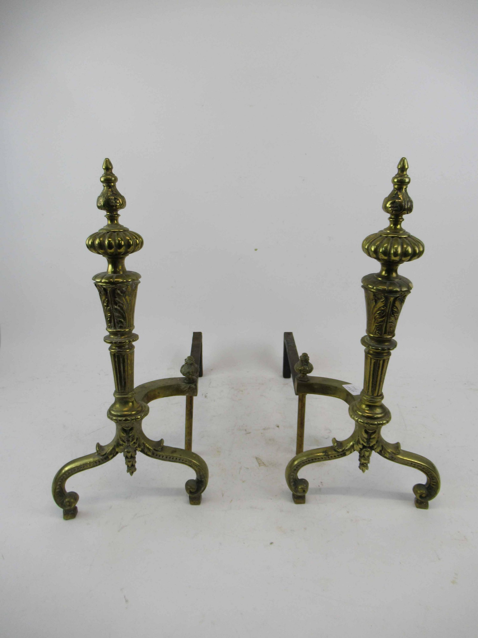 Pair of French Style Brass Andirons: Pair of French Style Brass Andirons. Used condition, wear, worn. 20" tall x 9" wide