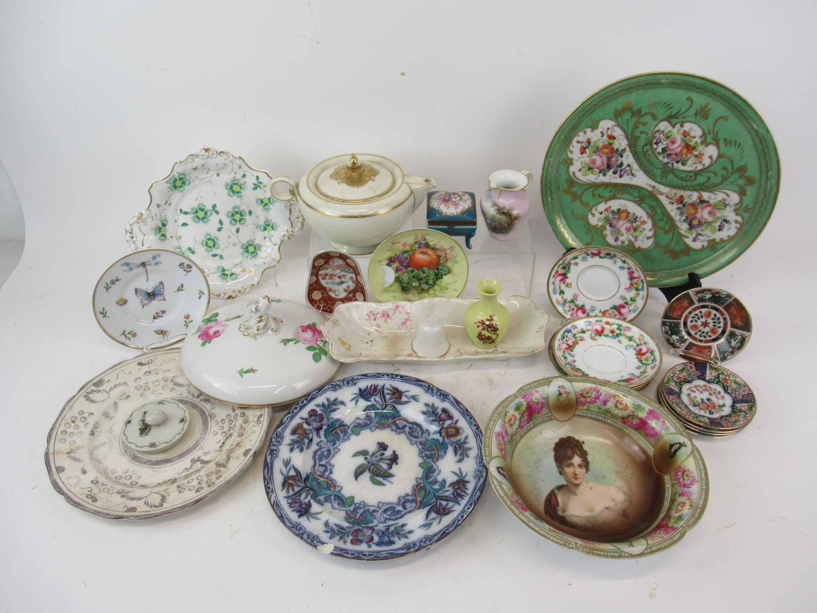 Group of Assorted Porcelain Table Articles: Group of Assorted Porcelain Table Articles including bowls, tea pot and plates. Used condition, wear, worn, chips.