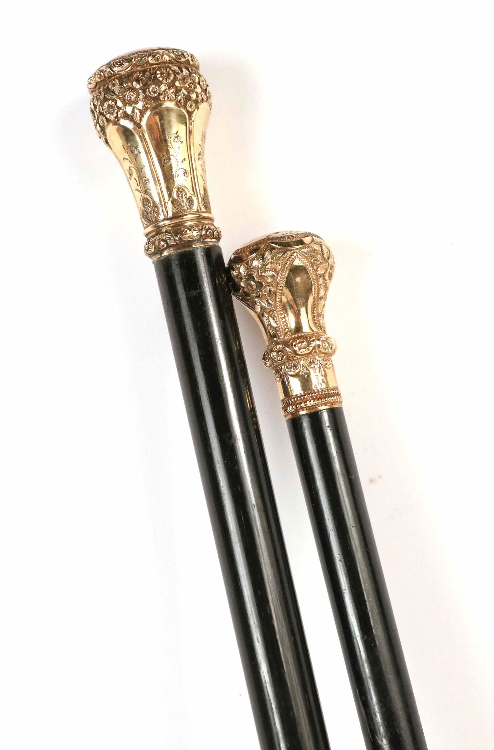 Knights of Minneapolis Vintage Walking Sticks: Engraved, "Presented to Supreme Chancellor William Ward K of P by the Knights of Minneapolis Oct 18 1889". Together with a gold mounted cane. 37"l. From the book "Pythian Knighthood, It's History and