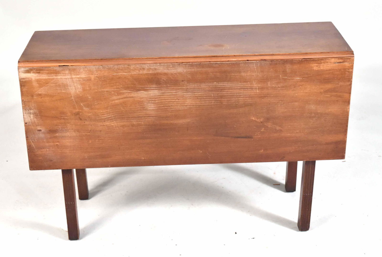 George III Mahogany Drop-Leaf Dining Table: English, third quarter 18th C. 27"h x 42"w x 14"d Property from the Estate of Ralph & Roberta Carpenter.