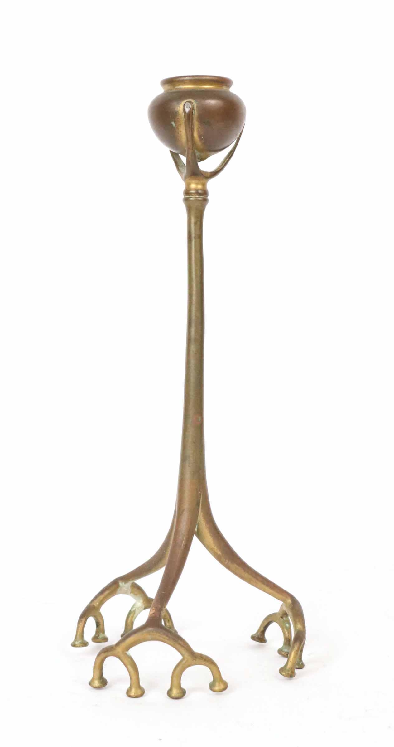 Tiffany Patinated Bronze Tripod Candlestick: C. 1898-1918, with urn form nozzle, the slender stem on root-form foot, marked "Tiffany Studios, New York." 12-1/2"h Property from the Estate of Ralph & Roberta Carpenter.