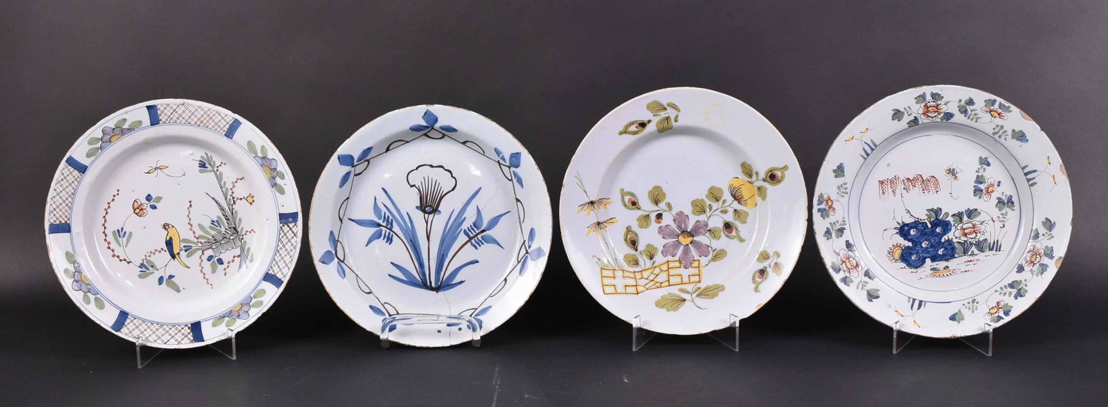 Four Tin Glazed Earthenware Plates: 19th Century. Size: 9"d Property from the Estate of Ralph & Roberta Carpenter.
