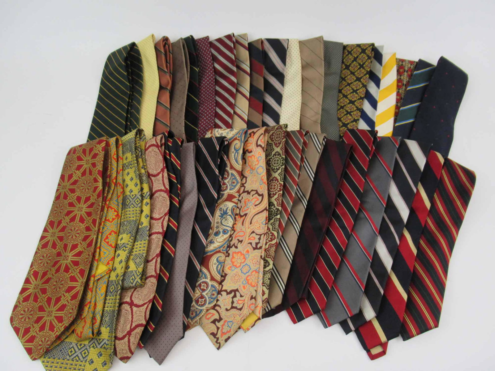 4 Robert Talbott Neck Ties: 4 Robert Talbott Neck Ties. Together with 30 Reis of New Haven Ties and 3 Peter Elliot Ties. Used condition, some wear, some stains.