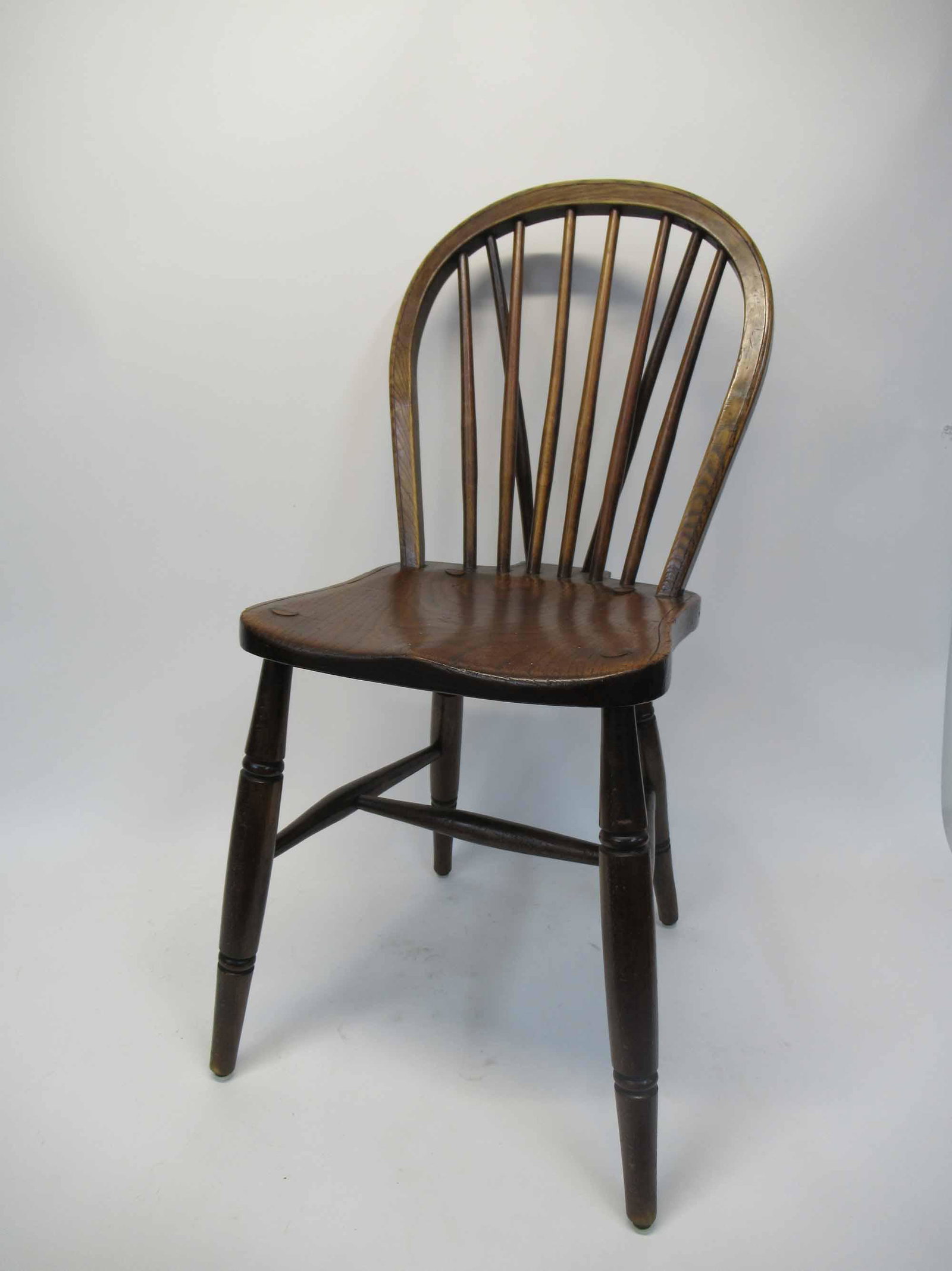 Two A. F. Howland Elmwood Braceback Side Chairs: Two A. F. Howland Elmwood Braceback Side Chairs, together with a matching set of side chairs. Used condition, wear, worn, 34" tall and 33" tall.