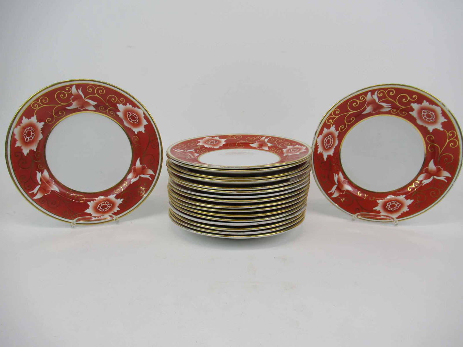 Antique Copleand Spode Floral Luncheon Plates: 18 Antique Copleand Spode Floral Rust Luncheon Plates. Used condition, wear, worn, gilt wear, scratching, chips. 8 7/8"