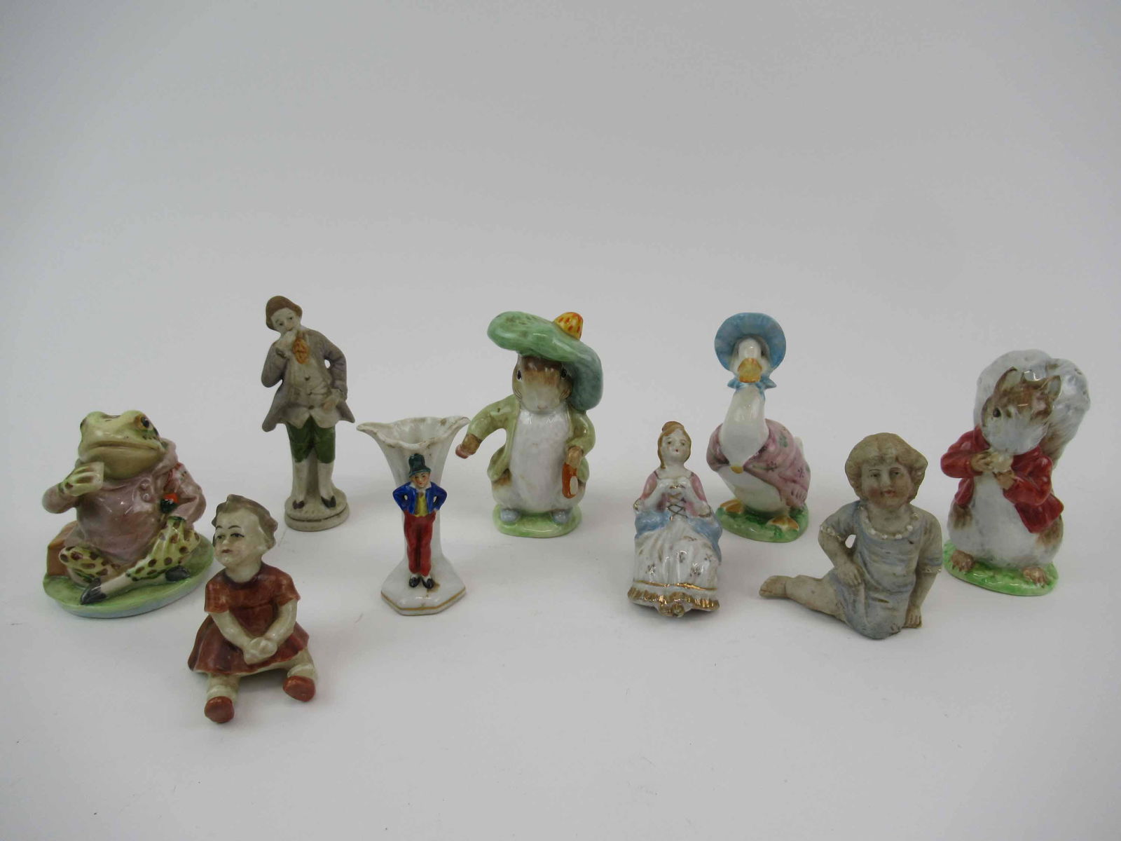 Four Assorted Beatrix Potter Figurines (1 of 10)