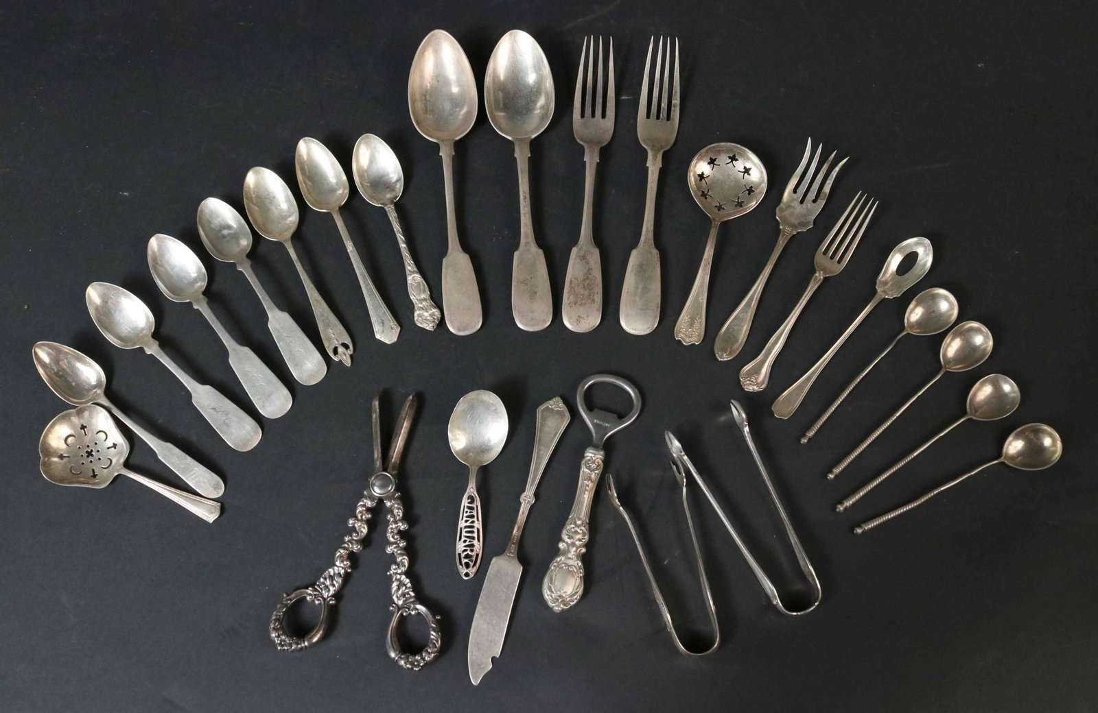 Group of Silver Flatware Items: Including Russian silver fiddle two forks & two tablespoons, and a set of four twist handle spoons, set of three American coin silver fiddle teaspoons, monogrammed JEC, three individual teaspoons, two
