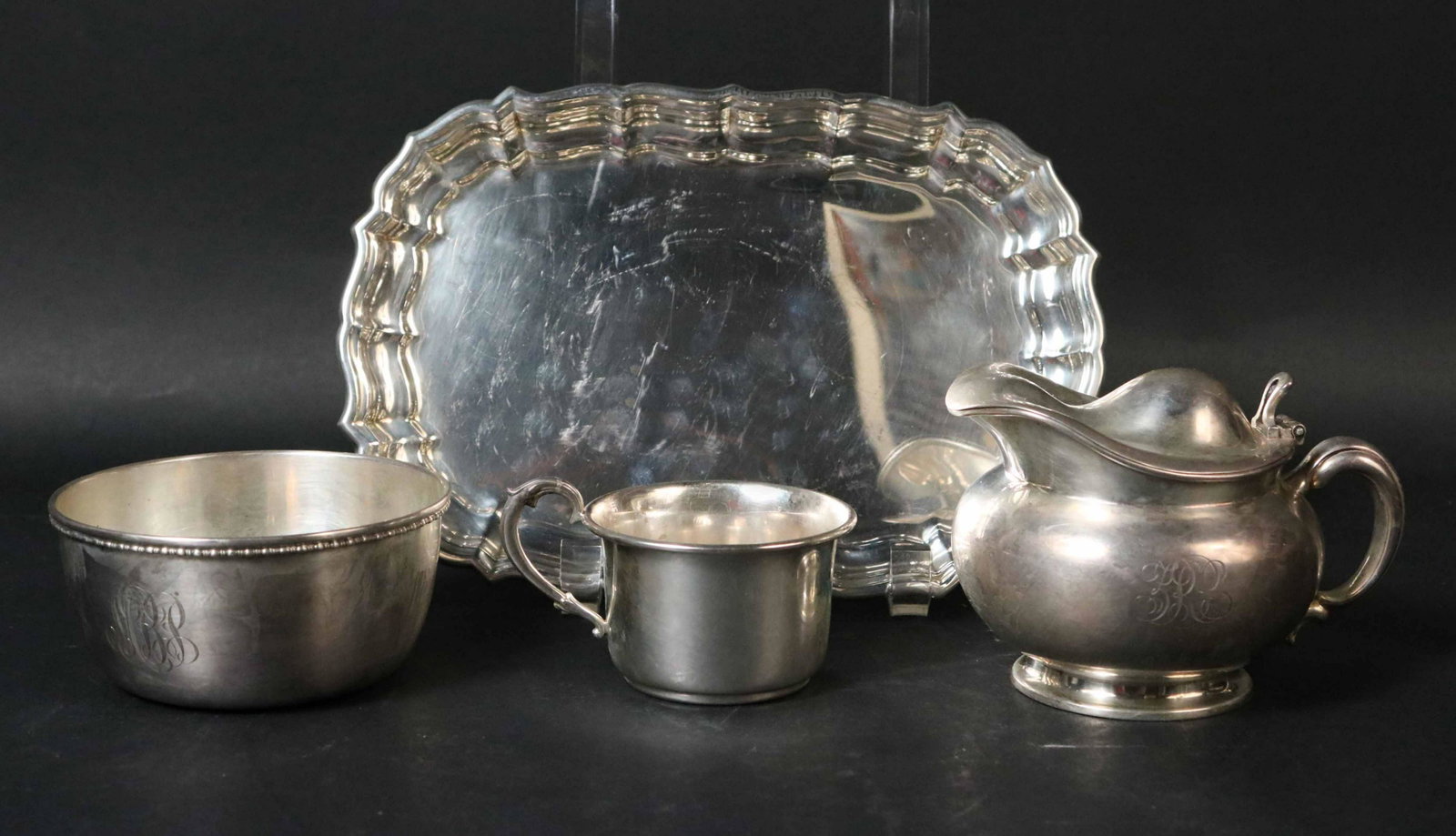 Group of Sterling Silver Table Items: Comprising Gorham cream jug, #4189 5/8 pint, monogrammed, American silver open sugar bowl monogrammed, Towle shaped oval tray, 9"l x 5"w, and Peruvian silver child's handled cup, total weight approx. 
