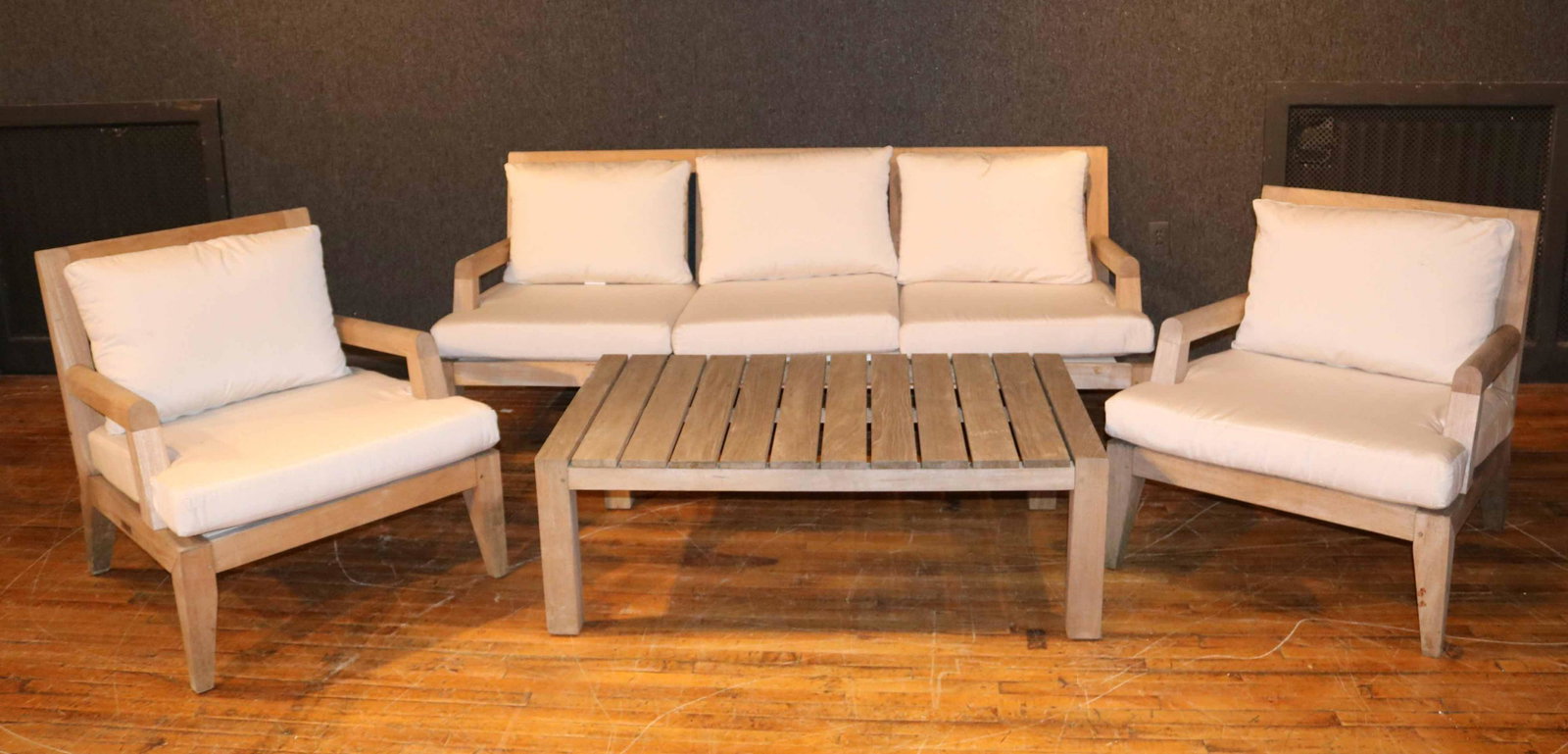 Group of Kingsley Bate Teak Patio Furniture: Comprising, a pair of armchairs, a settee, and a low table marked "Kingsley Bate." Settee: 32"h x 6'8"l x 28"d