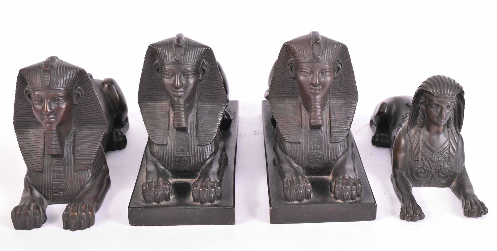 Four French Bronze Sphinx Sculptures: 19th/20th C. two inscribed "C. Kauba", Carl Kauba, one similar sphinx without base, and another without base.