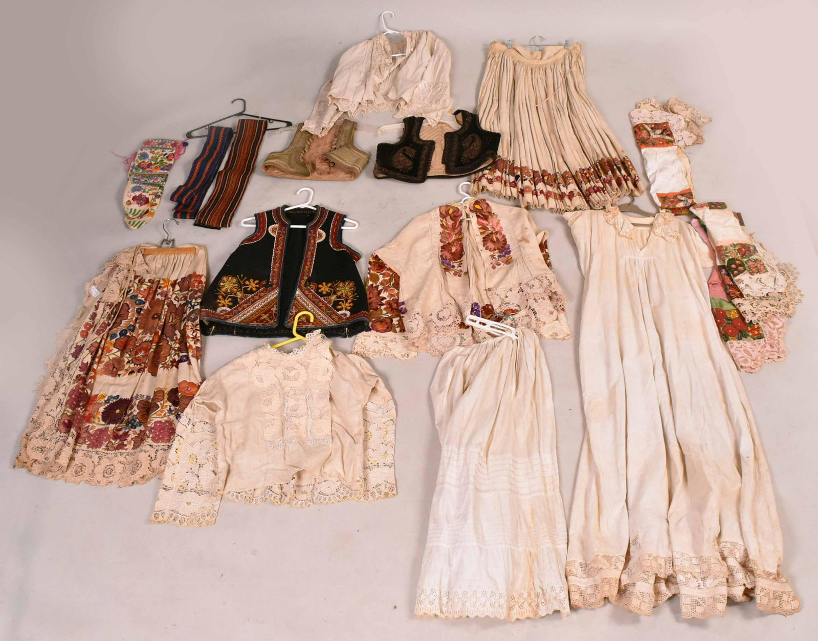Group of Ottoman Clothing: Including skirts, jackets, embroidered vest/waistcoats, blouses, socks and belts. Provenance: Property from the Estate of Judith Applegate, Princeton, NJ.