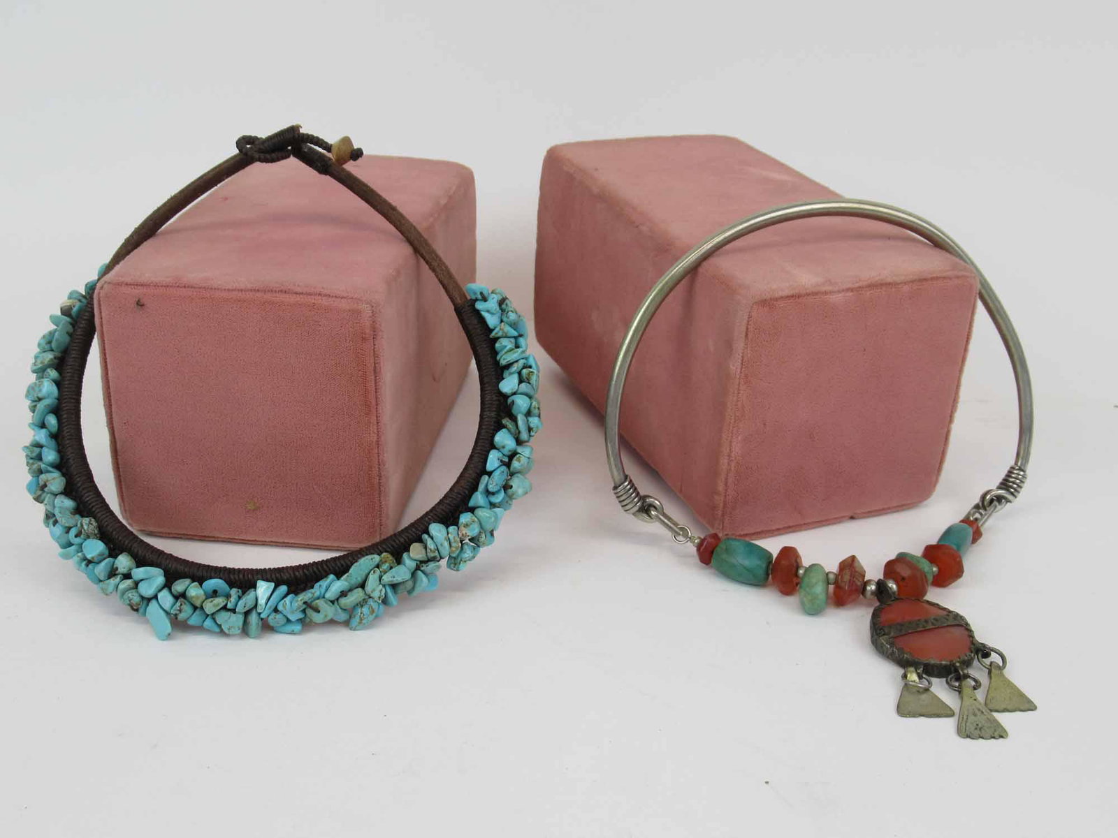 Silvered Metal Brass & Hardstone Choker Necklace: With center carnelian & brass pendant, 15"l, 2-1/2"drop. Together with a turquoise nugget on cord choker necklace, wear to both.