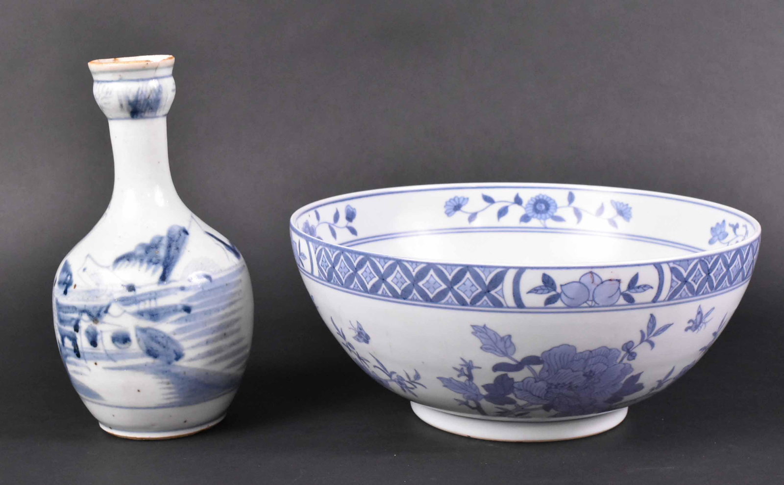 Chinese Blue and White Porcelain Vase and Bowl: 19th Century. Size: Bowl 4 3/4"h x 10"d Condition: vase has cracks and chips to neck and rim, bowl has wear. Property from the Estate of Ralph & Roberta Carpenter.