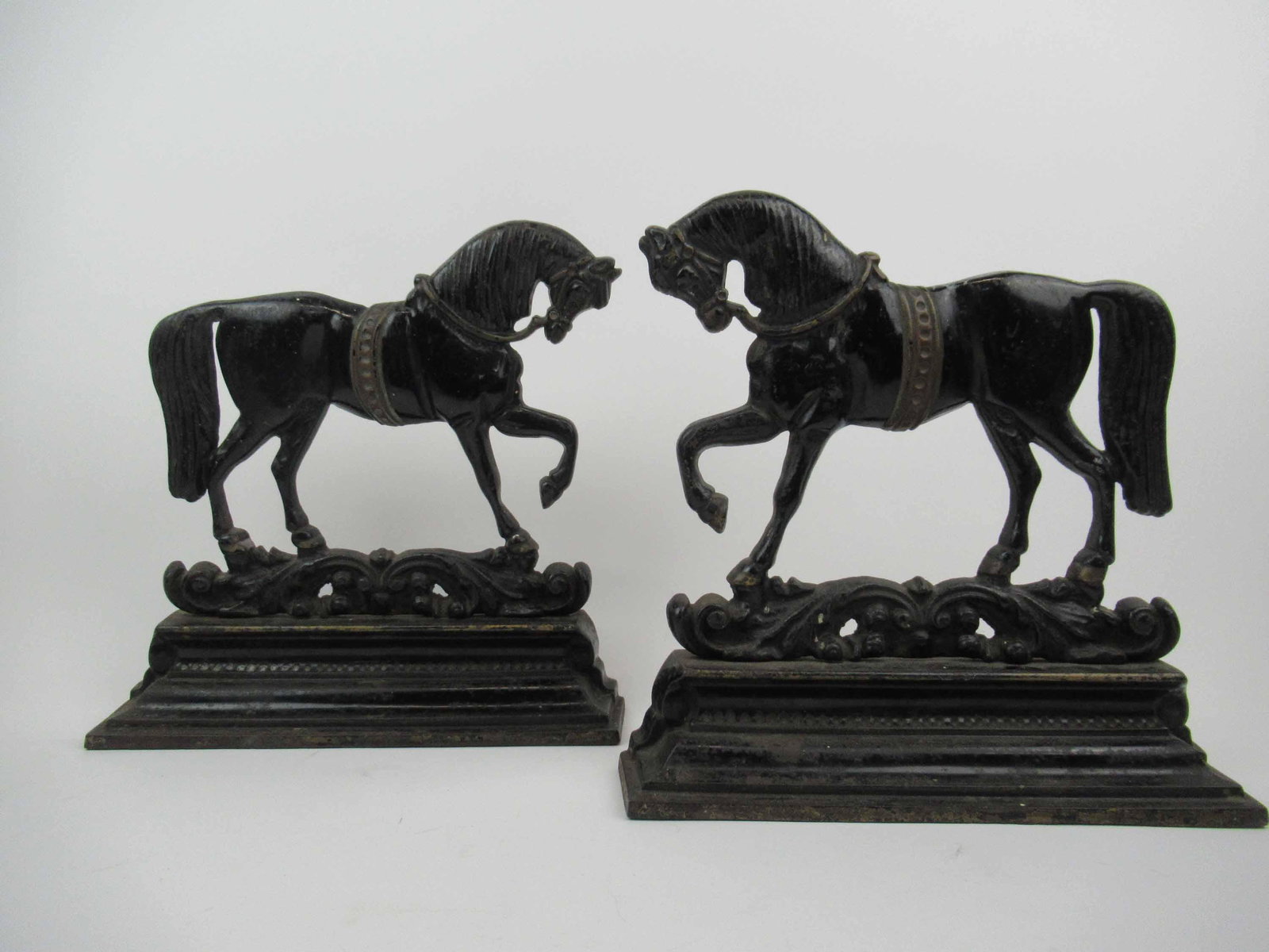 Pair of Black Painted Horse Door Stops: Pair of Black Painted Horse Door Stops. Used condition, wear, worn, paint loss. 10"h x 11"w