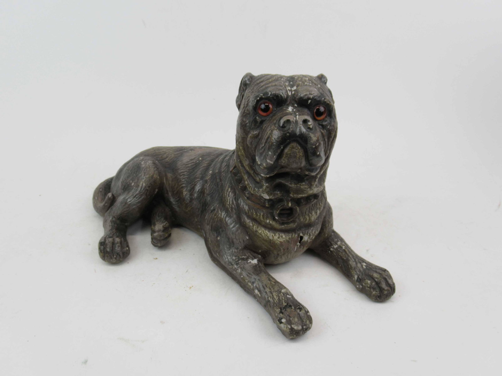 Plaster Austrian Bull Dog Sculpture: Plaster Austrian Bull Dog Sculpture with nice color and glass eyes. Used condition, wear, worn, cracks, chips. 16" long x 9 1/2" tall.