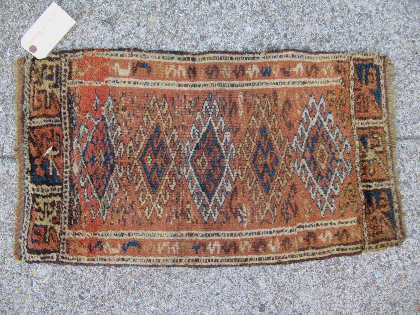 Caucasian Throw Rug With Geometric Design (1 of 4)