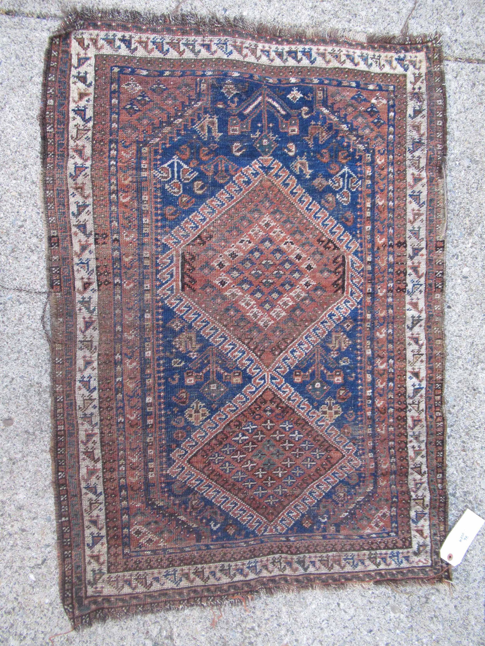 Caucasian Prayer Rug With Central Blue Ground: Caucasian Prayer Rug With Geometric Design having Central Blue Ground and animal border. Used Condition, wear, worn, torn border. 46" x 32 1/2"