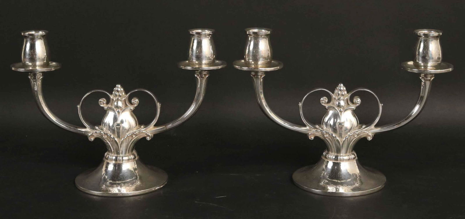 Pair Gorham Sterling Silver Two-Branch Candelabra: #E559 Cement Loaded, weighted sterling silver in the Danish Taste, each 7-1/4"h x 10"w.