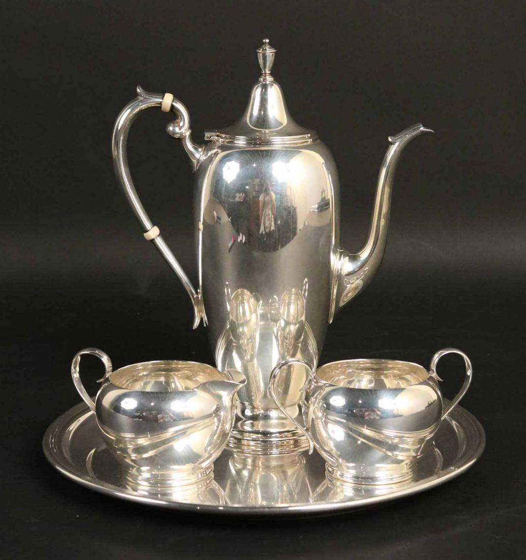 Gorham Sterling Silver 3 Piece Coffee Service: Comprising coffee pot with urn finial, #309 8, 9-3/4"h, open sugar bowl, #392, cream jug #393, total weight approx. 20 T.O. Together with a similar Gorham sterling silver circular tray, #606 8, 10"d,