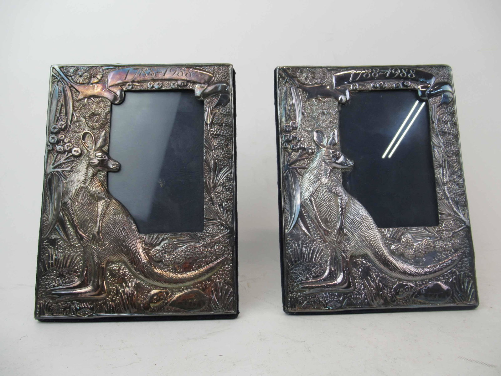 Pair of Sterling Silver Kangaroo Picture Frames: Pair of Australian Bicentenary 1788-1988 Sterling Silver Kangaroo Embossed Picture Frames. Stamped RRB. Used condition. wear, 8" x6".
