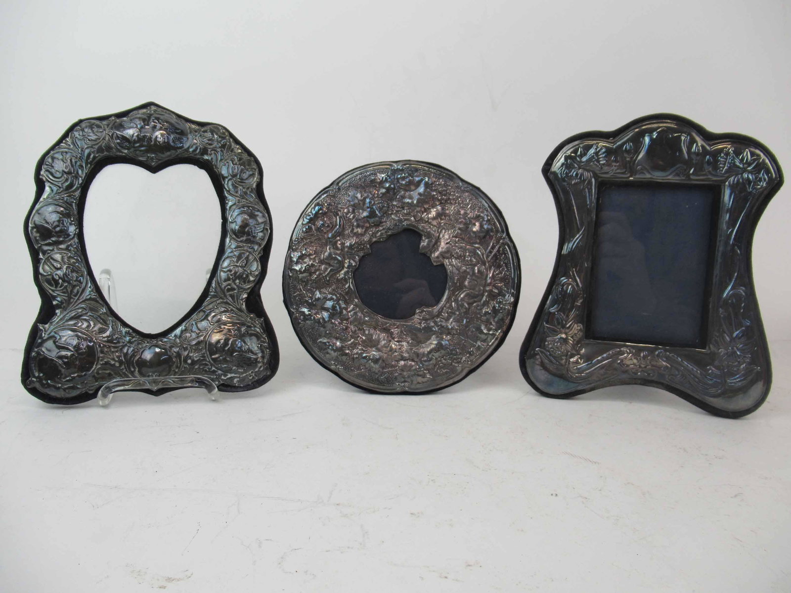 3 Keyford Sterling Silver Embossed Picture Frames: 3 Keyford Sterling Silver Embossed Picture Frames, Used condition, wear, worn, one missing back. Largest size 8" tall x 6" wide