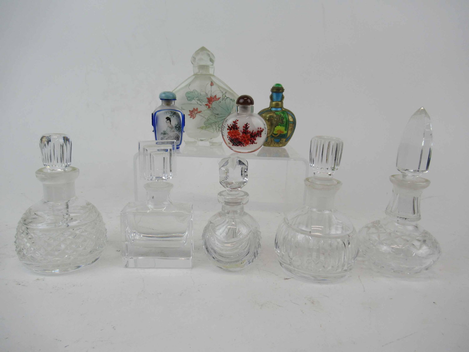 Three Waterford Crystal Perfume Bottles: Three Waterford Crystal Perfume Bottles, one with broken stopper. Together with crystal Villeroy Boch perfume, Colle Italy perfume and three reverse painted Japanese snuff bottles. Used condition, wea
